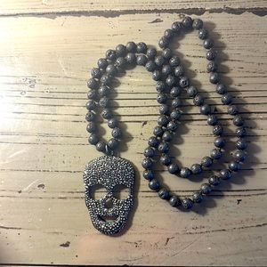 Skull Rhinestone pendant on Lava Stone necklace